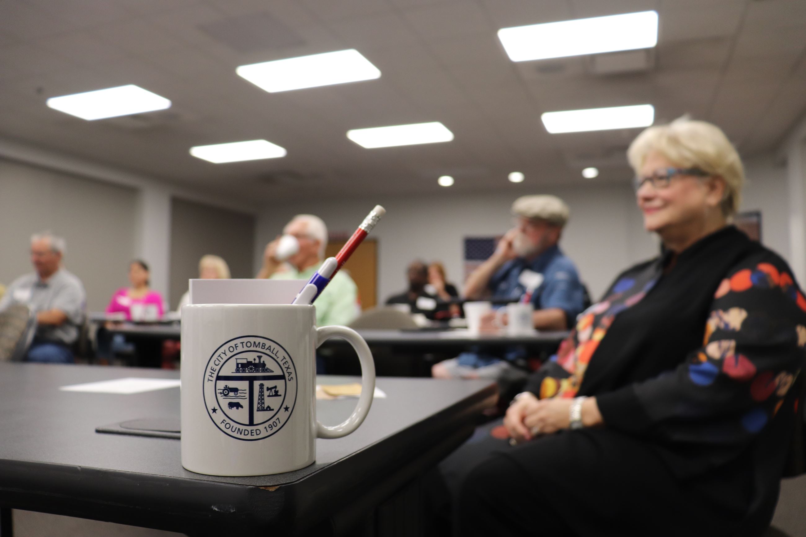 participants of Kaffeeklatsch receive a City of Tomball mug