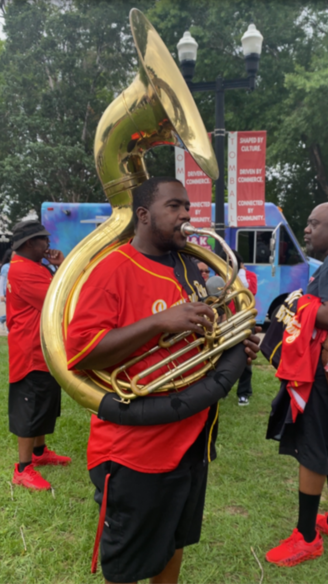 Tuba player from Bayou City Brass Band warming up